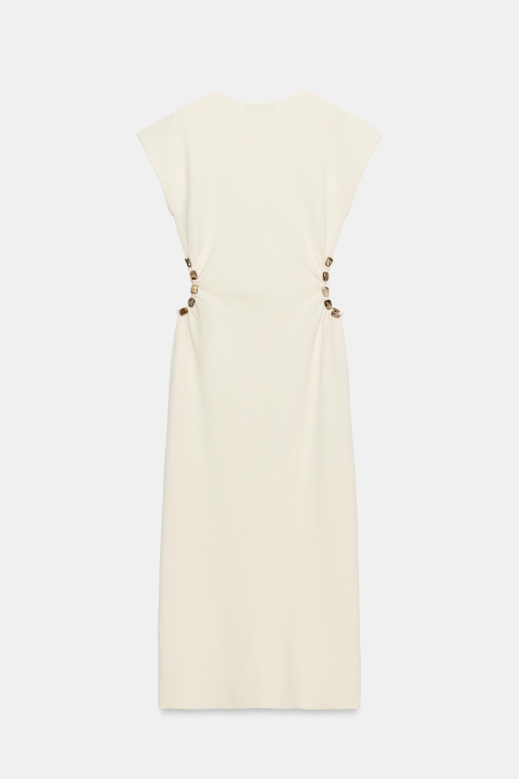 ROBE EN MAILLE CUT-OUT À BOULES